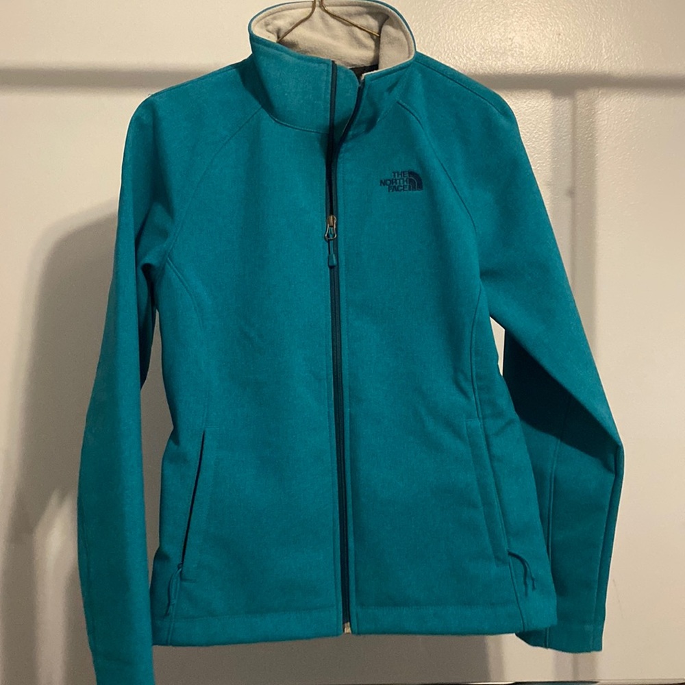 Womens North Face jacket. Size small. Turquoise.